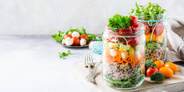 istock Salad in glass jar with quinoa 667365372