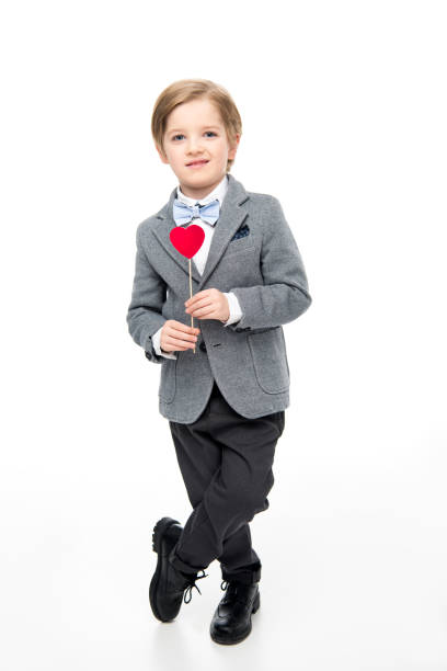 istock Cute little boy in suit 667365832
