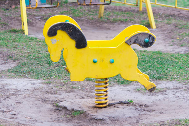 istock The broken child's swing. Unhappy childhood 667371576