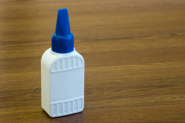 istock empty blank bottle or vial on wood background 667376146