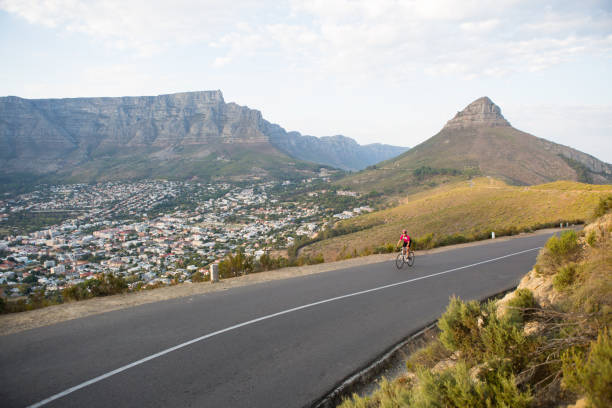 istock Female cyclist out on a ride 667378786
