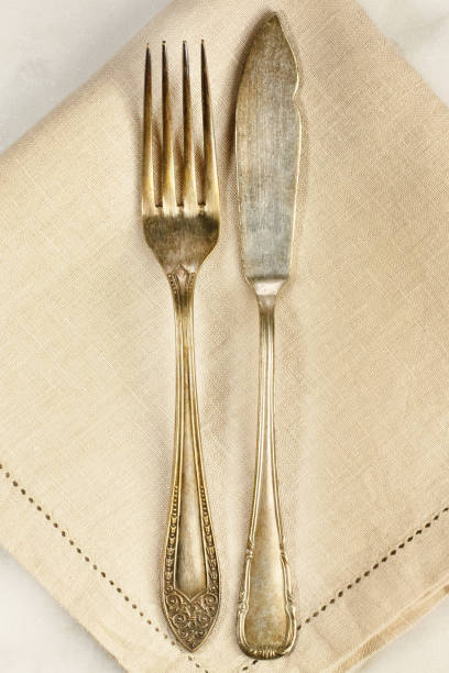 istock Overhead photo of vintage fork and knife with copyspace 667379588