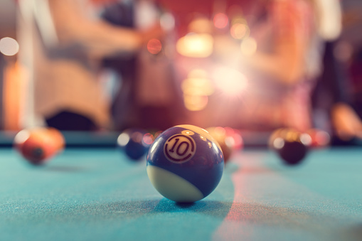 Close-up of billiard ball number two blue color on billiard table, snooker aim the cue ball. Realistic glossy billiard ball. 3d rendering 3d illustration