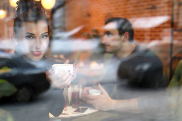 istock young couple meets in a cafe on a date 667390816