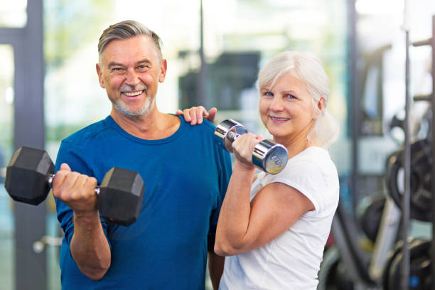 istock Mature couple doing fitness exercises 667394844