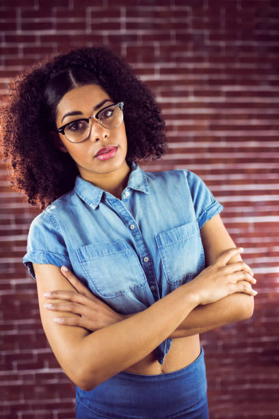 istock Attractive hipster posing with arms crossed 667394878