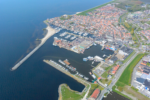 Aerial view on the former island of Urk at the IJsselmeer in The Netherlands with the lighthouse in the center.
