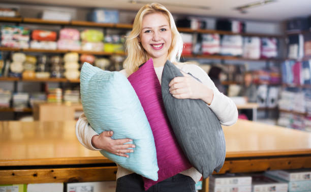 istock Woman enjoying purchased home textiles 667396836