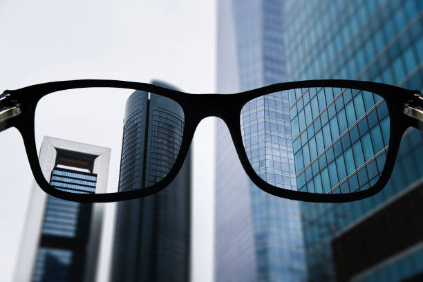 istock Office buildings as seen from glasses 667396914