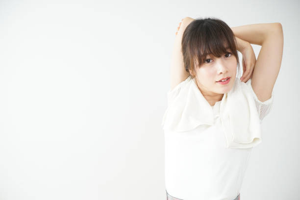 istock Young woman training at home 667399756