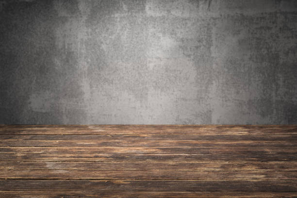 istock old table with concrete wall . Ready for product montage display. 667403226