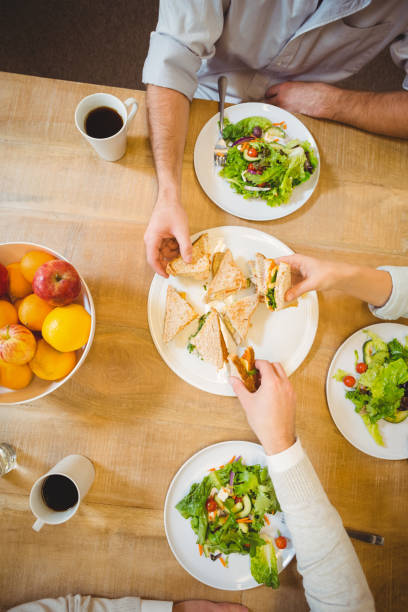 istock Business people having brunch in canteen 667409106