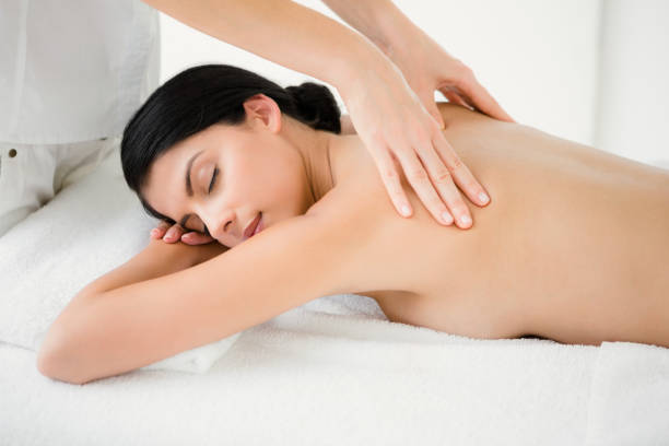 istock Woman receiving a back massage 667417786