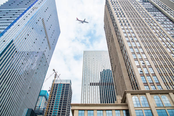 istock Looking up at business buildings 667428262