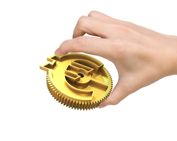 istock Hand holding golden gear with currency symbol 667428628