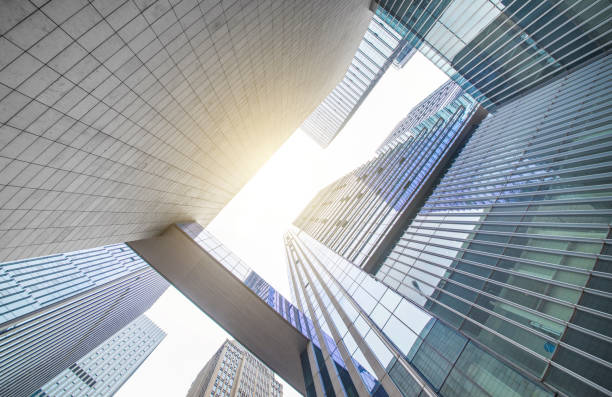 Looking up at business buildings