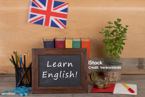 Blackboard With Text Learn English Flag Of The United Kingdom Stock Photo - Download Image Now