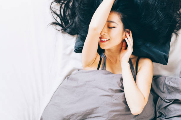 istock Young Woman in Bed 667446494