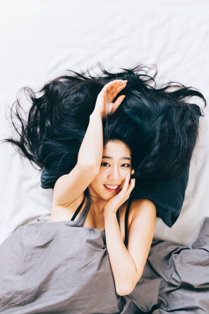 istock Young Woman in Bed 667446544