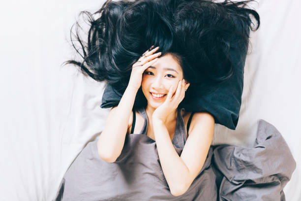istock Young Woman in Bed 667446546