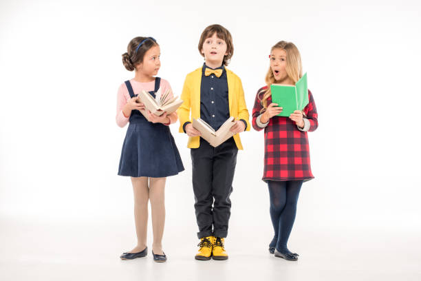 istock Schoolchildren standing with books 667450792