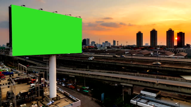 green screen advertising billborad on the road at twilight night