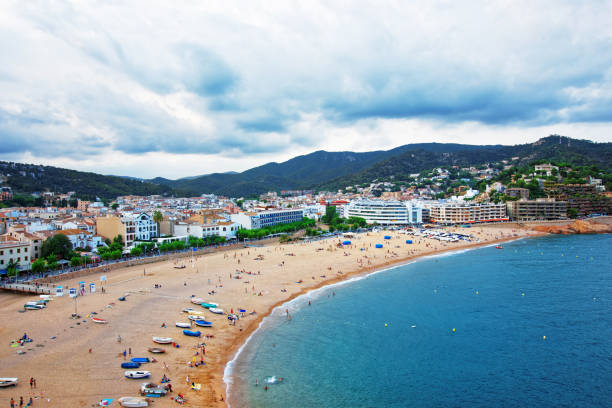 istock Beach with people at Tossa de Mar in Costa Brava 667454702
