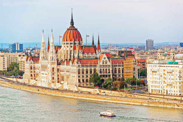 istock Water boat at Danube River with Hungarian Parliament Building 667458264