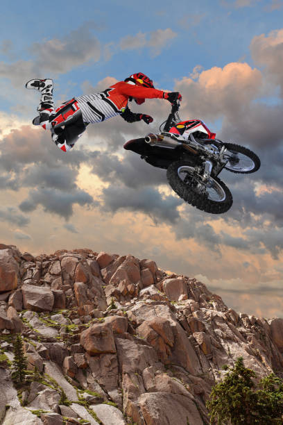 istock Motorcycle Rider Performing Aerial Stunt 667461634
