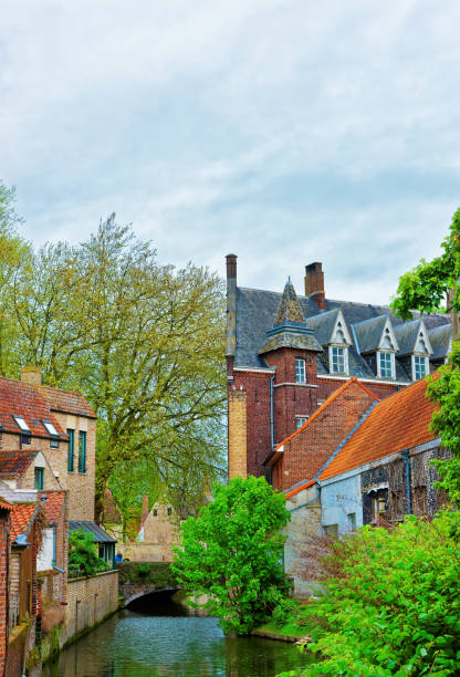istock Small bridge over canal Brugge 667461682