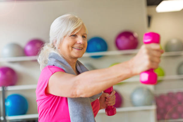 istock Senior woman at the gym 667461996