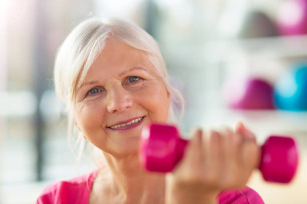 istock Senior woman at the gym 667462176