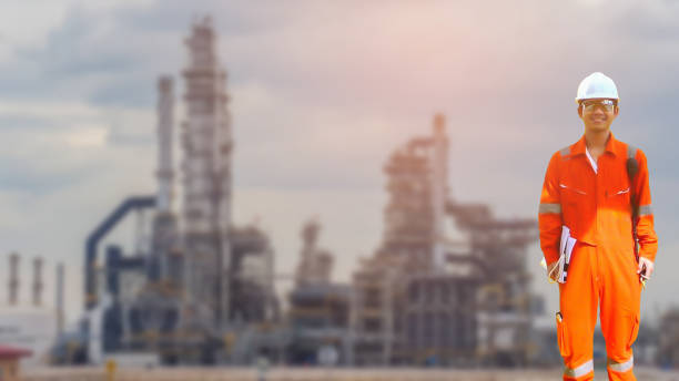 istock Working engineer at offshore oil and gas refinery 667465444