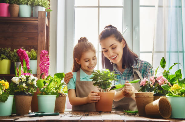 happy family in spring day - spring child green small imagens e fotografias de stock