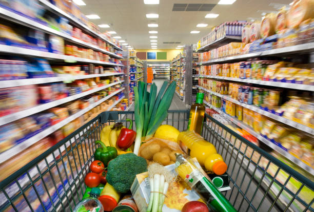 Shopping cart in the supermarket stock photo