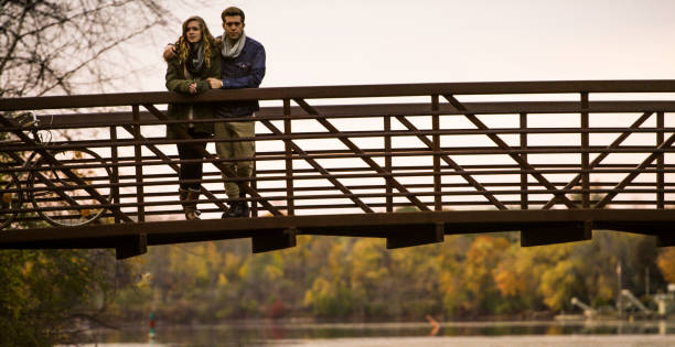 Free Stock Photo of Woman With Long Hair Standing on a Bridge ...