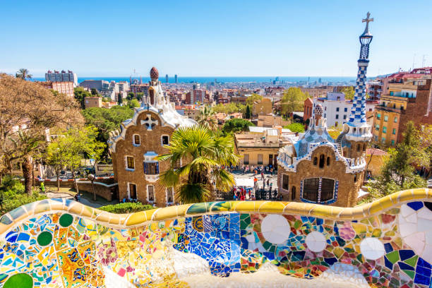 istock parc guell antoni gaudi barcelona mosaic bank bench 667481092