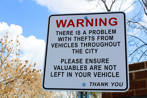 Warning sign about theft in the area