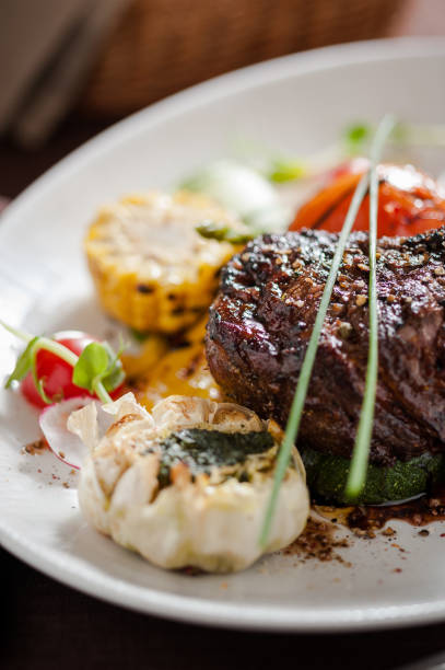 istock Grilled steak with grilled vegetables 667485736