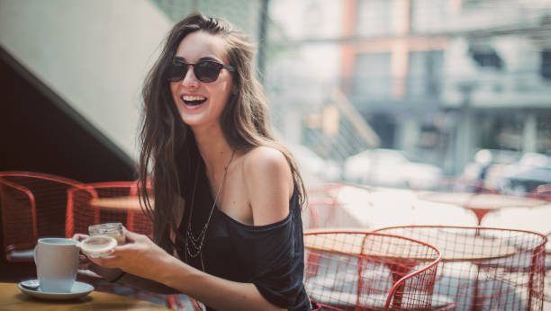 istock Woman smiling in cafe 667491666