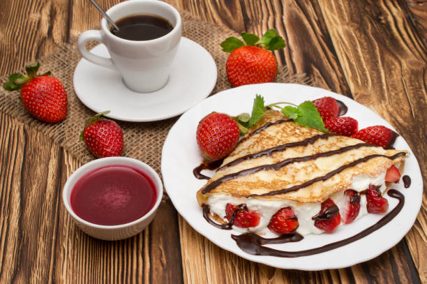istock Crepes with Banana and strawberries 667491710