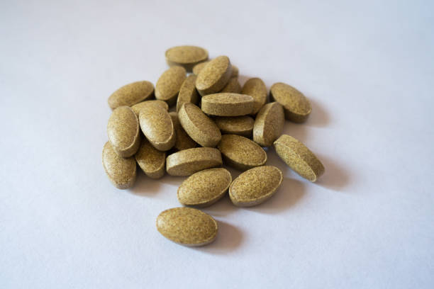 istock Handful of rutin supplement tablets 667492074