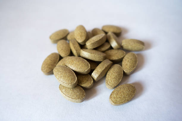 istock Handful of rutin supplement tablets 667492140