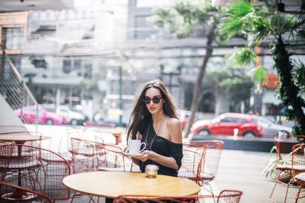 istock Young woman in cafe 667492364