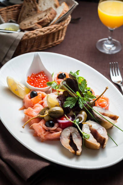 istock Seafood salad with salmon, caviar and other fish 667495390
