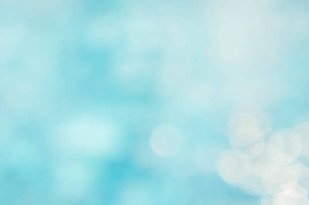 istock abstract green blue blur backgruond , wallpaper blue wave with sunlight bokeh texture background 667495454