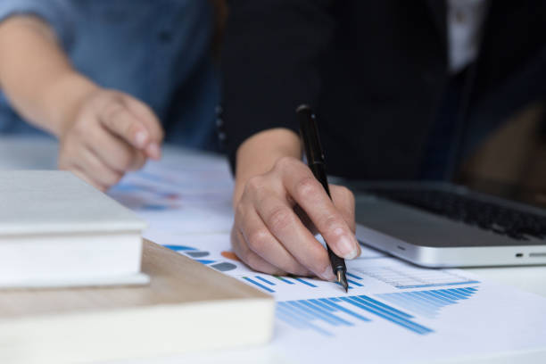 istock Business team analyzing income charts and graphs with modern laptop computer. business analysis and strategy concept. 667499334