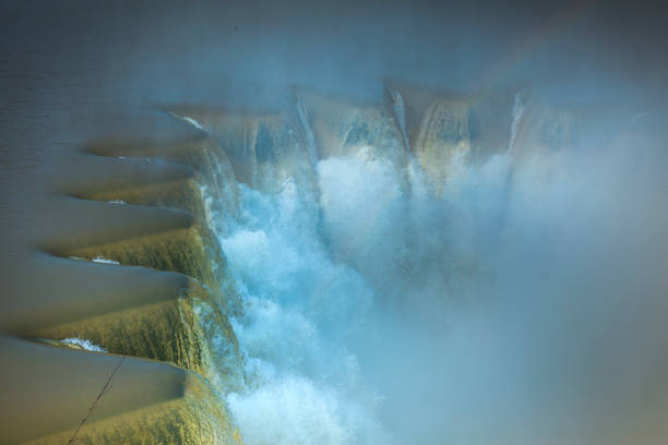 istock water flow to spillway on station dam, irrigation 667502288