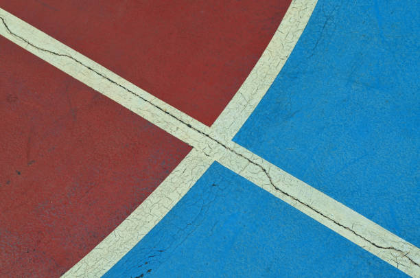 istock Red and blue concrete basketball floor background 667510284