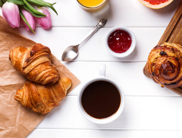 istock Breakfast with croissants and coffee 667510554